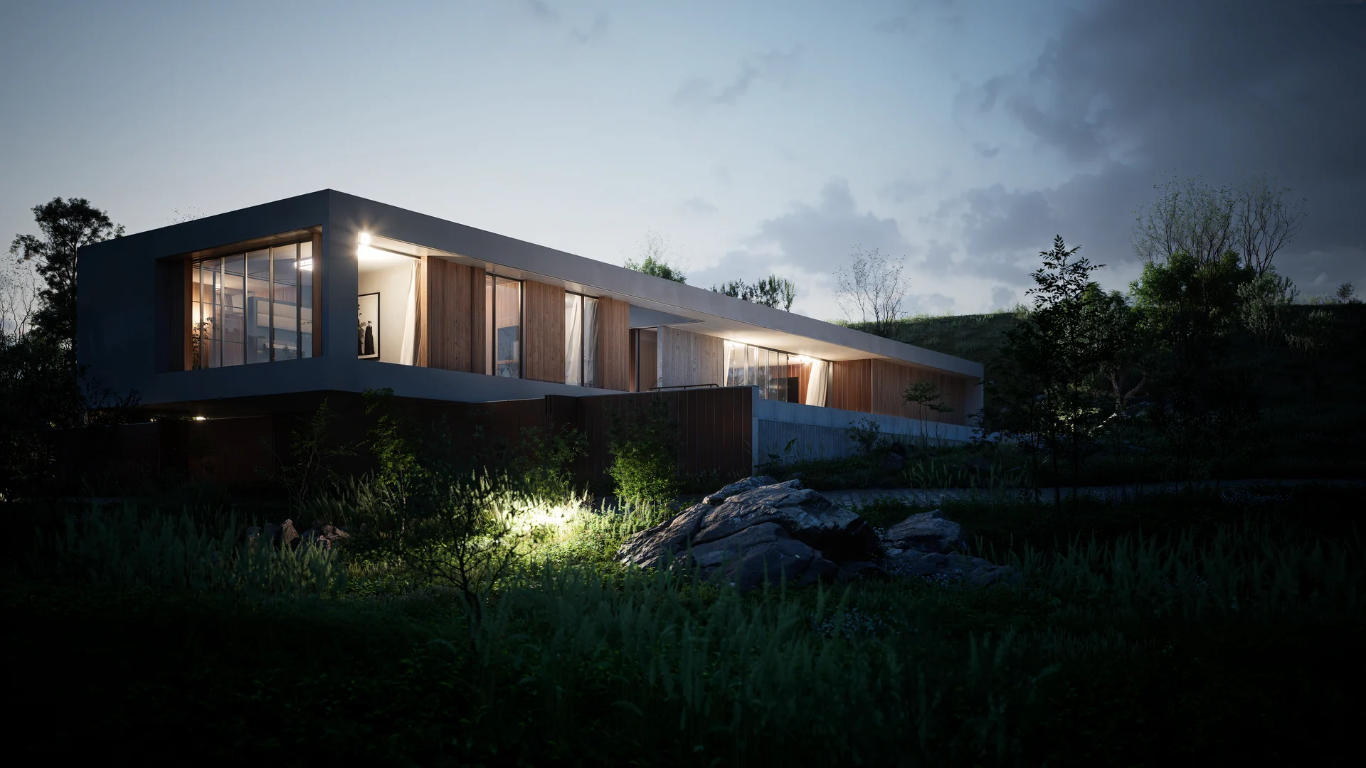 Warm interior light shines through the timber-screened Bonsai residence at dusk