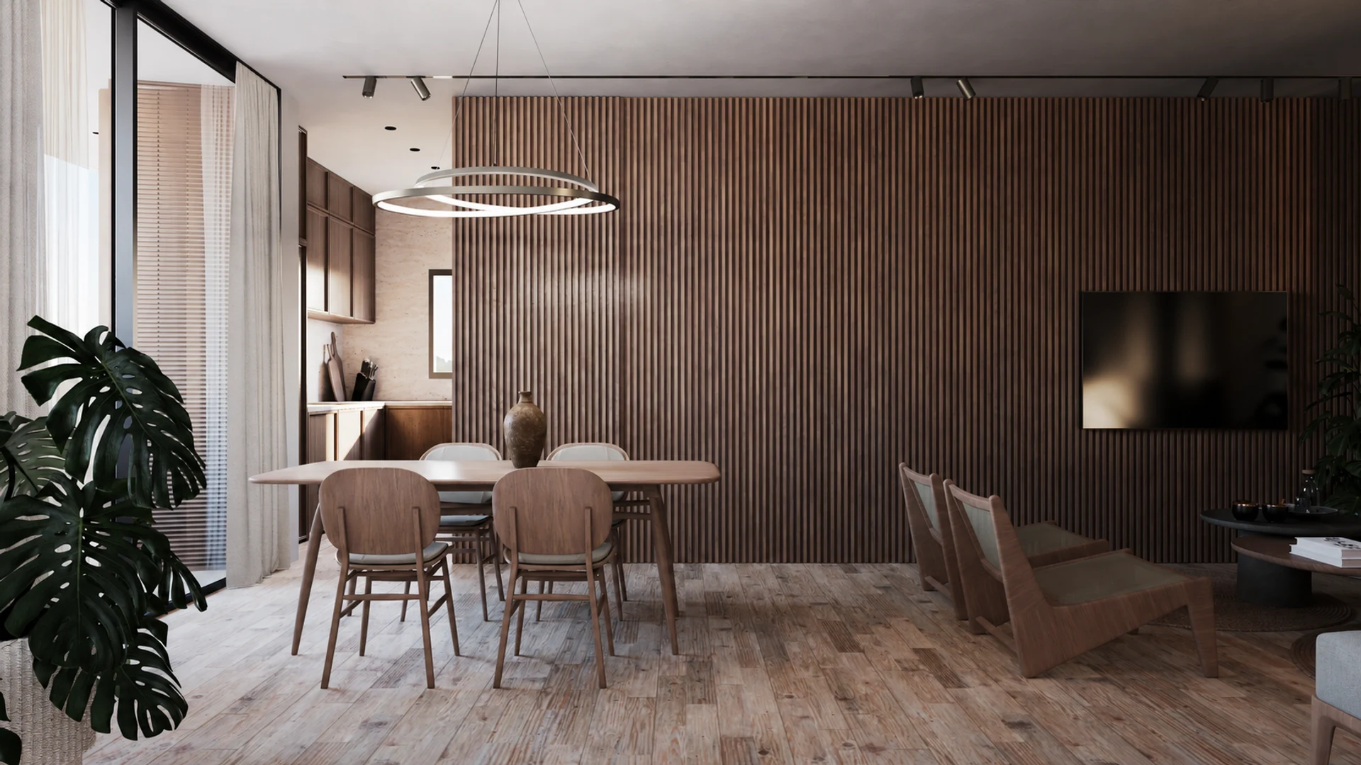 Chili dining area and kitchen with warm timber finishes